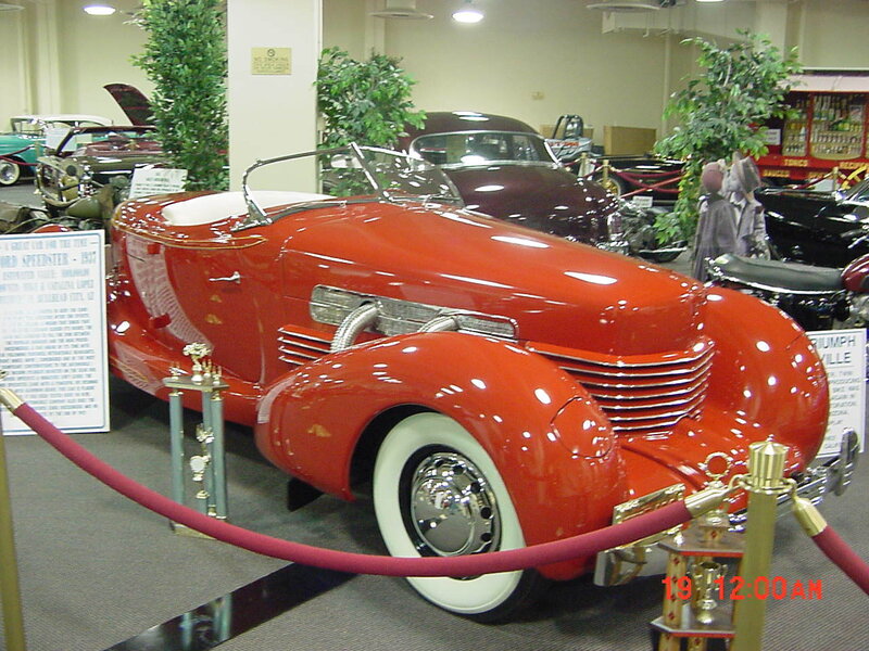 Red vintage car on display