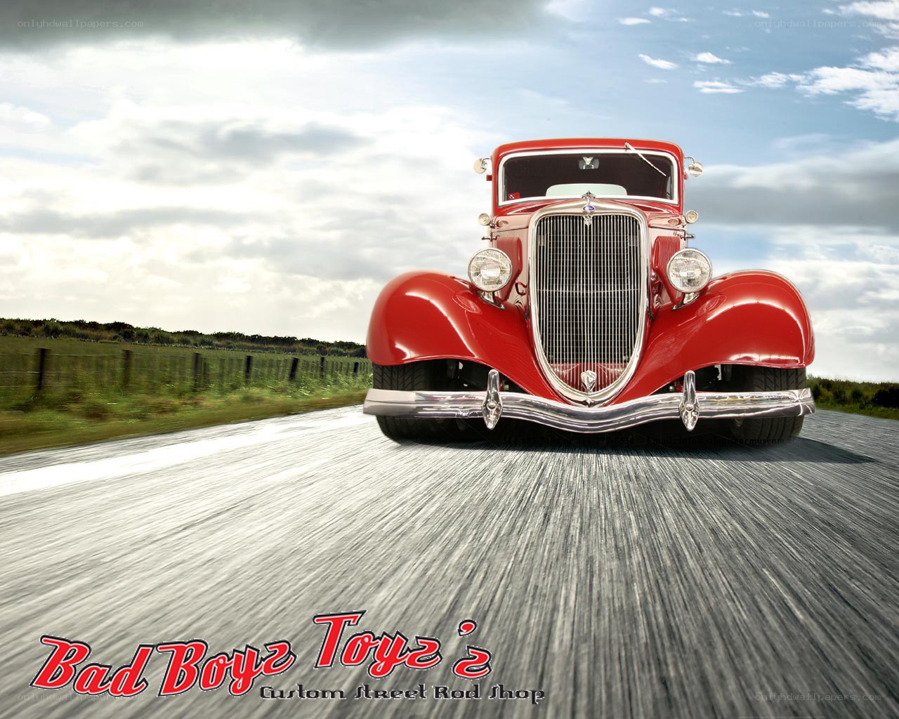 Red vintage car on road