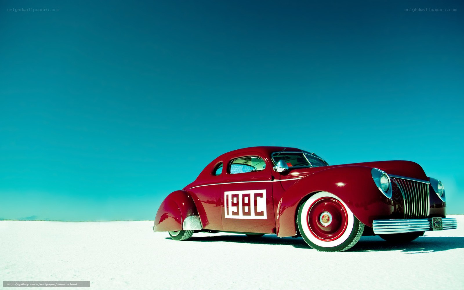 Red vintage car on salt flat