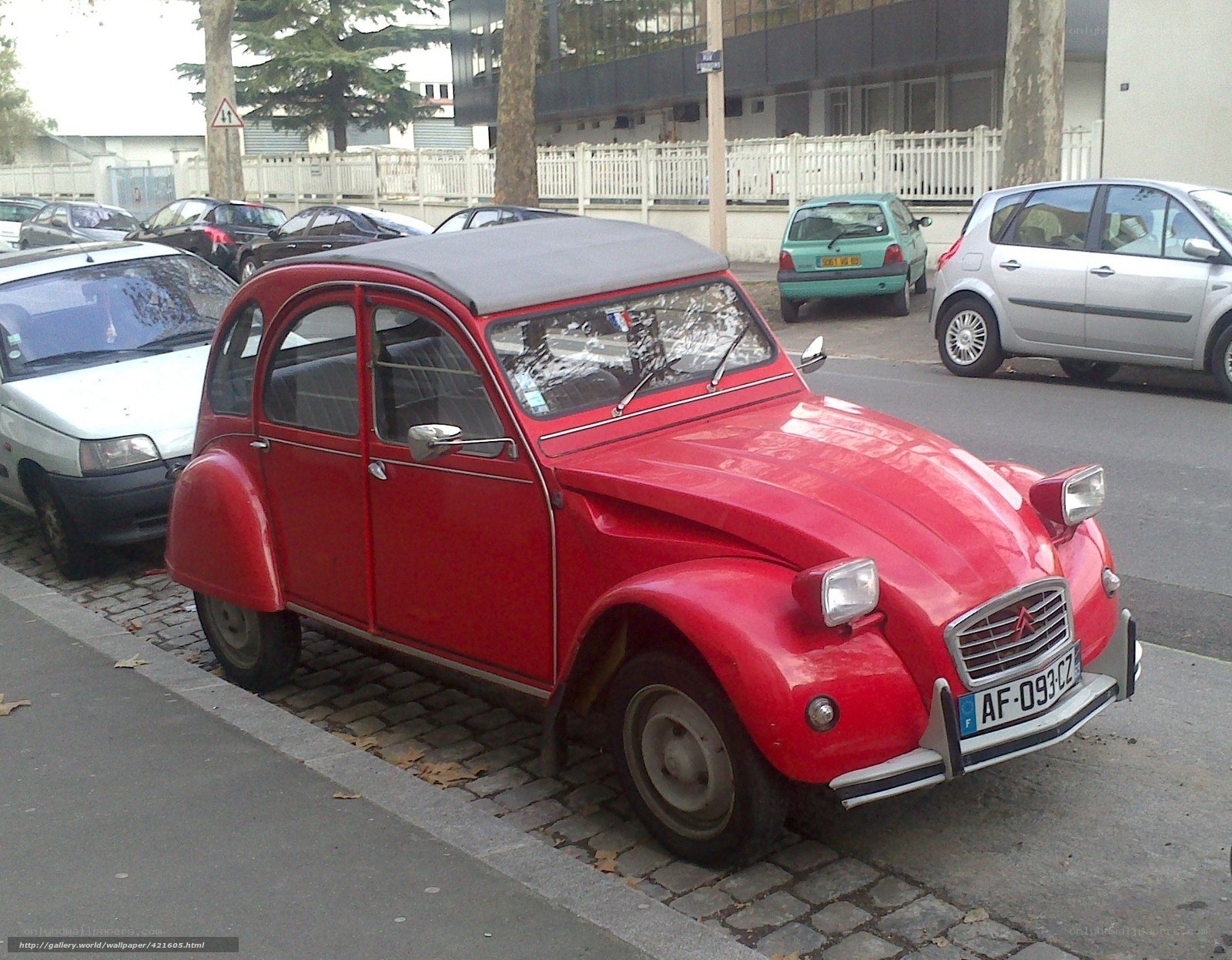 Red vintage car on street