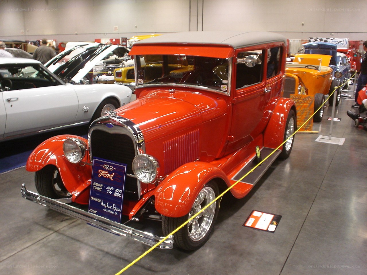 Red vintage Ford car on display