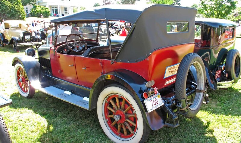 Red vintage Hudson car at show