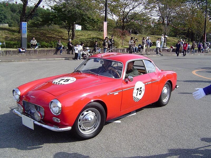 Red vintage race car on display
