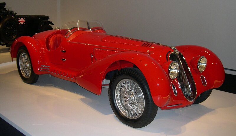 Red vintage race car on display