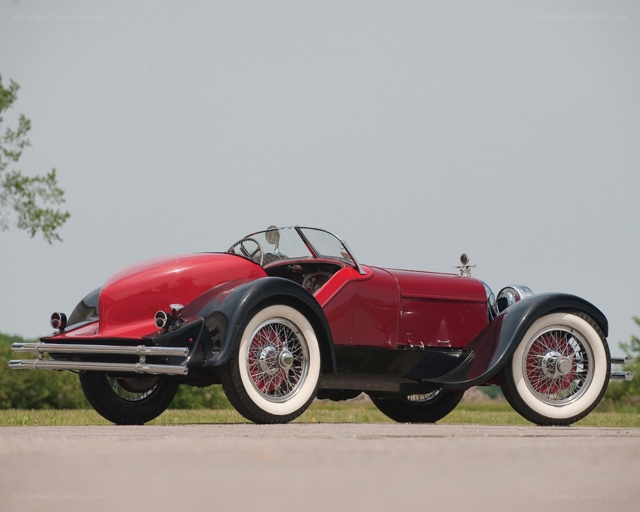 Red vintage roadster car