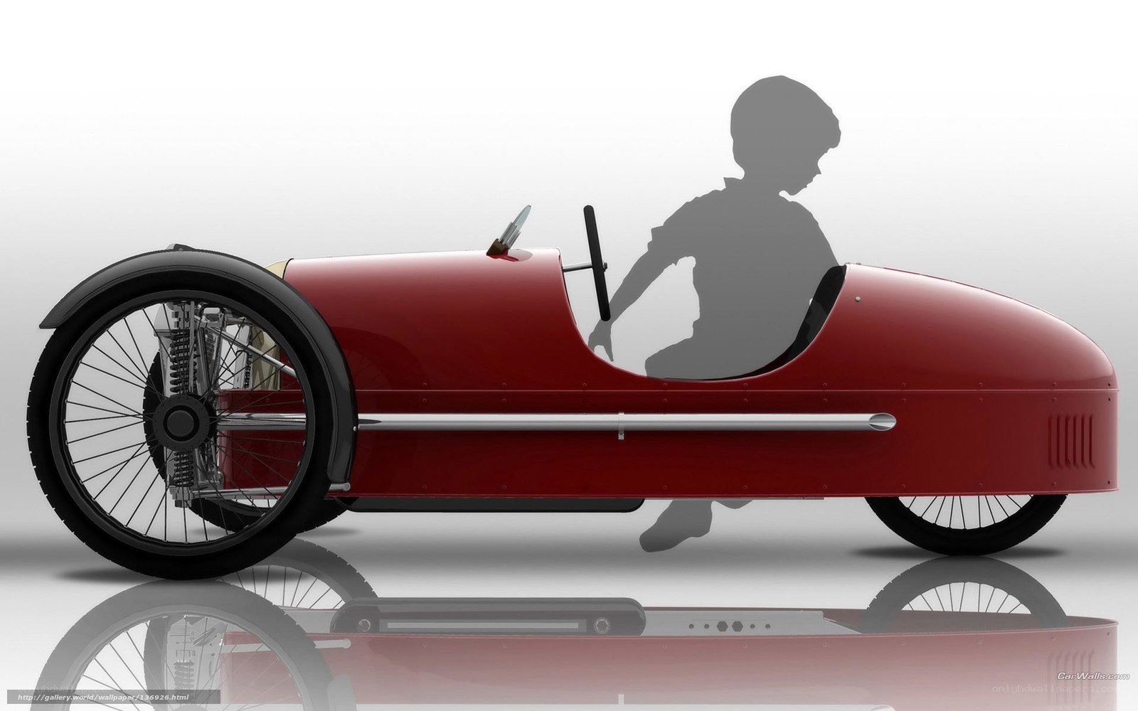 Red vintage-style three-wheeled car