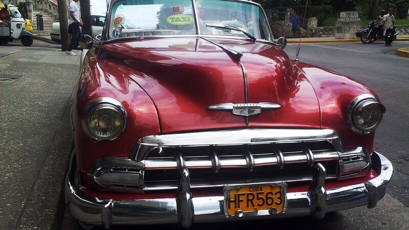 Red vintage taxi in Cuba