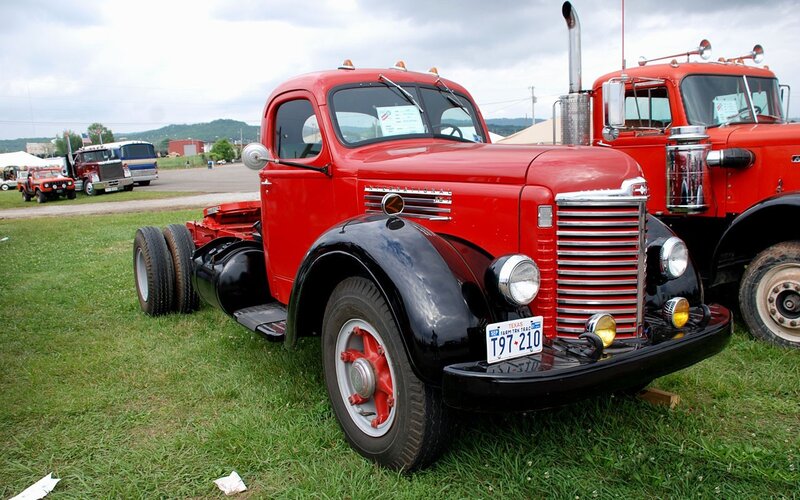 Red vintage truck on grass