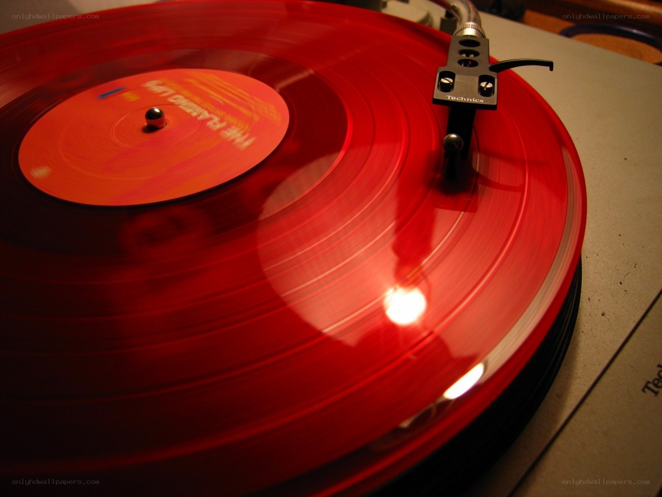 Red vinyl record spinning