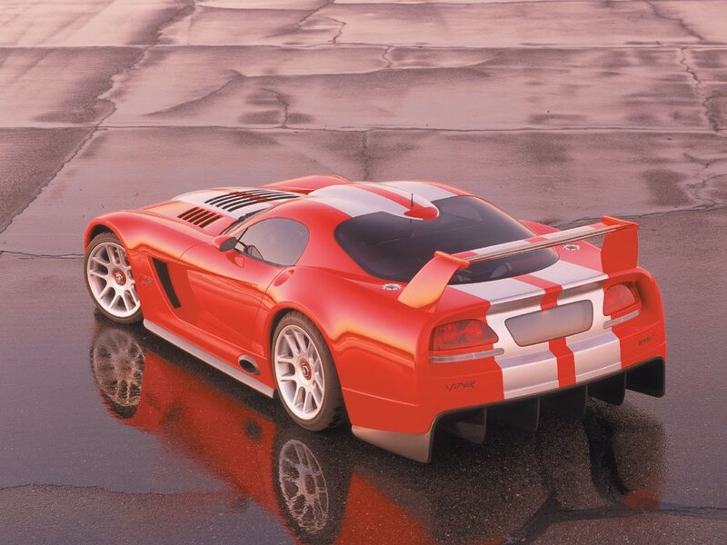 Red Viper sports car on wet pavement