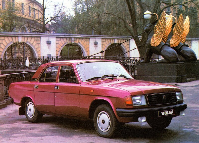 Red Volga car in city