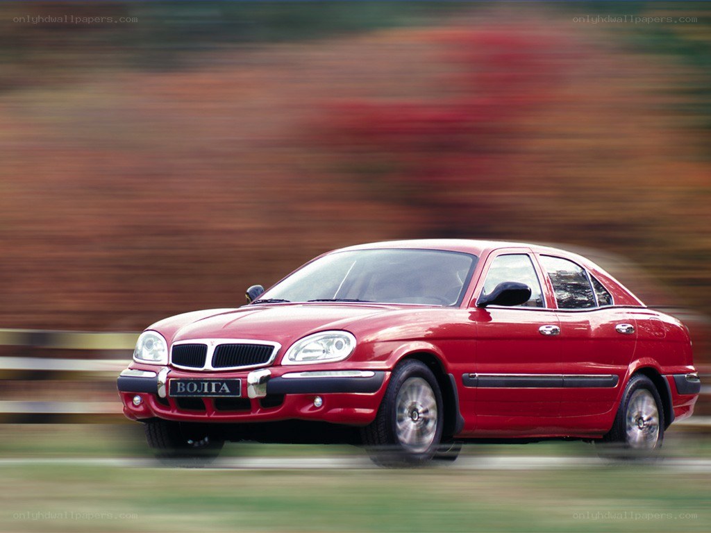 Red Volga car in motion