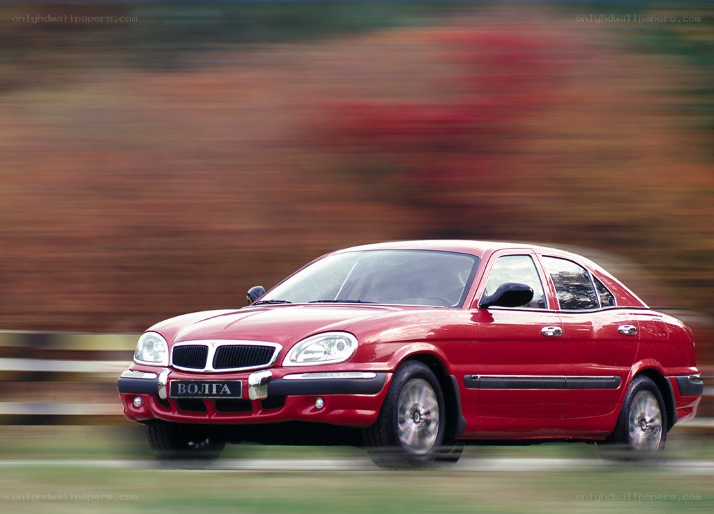 Red Volga car in motion