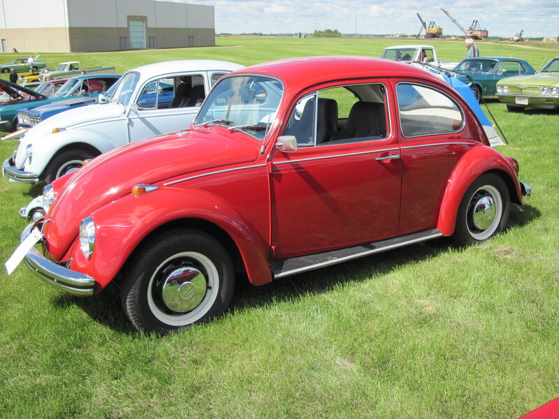 Red Volkswagen Beetle — Calm, Afternoon, Photograph