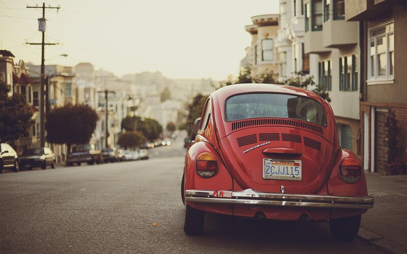 Red Volkswagen Beetle — Calm, Sunset