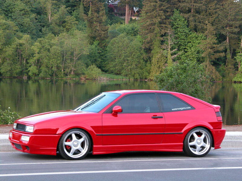 Red Volkswagen Corrado by a lake