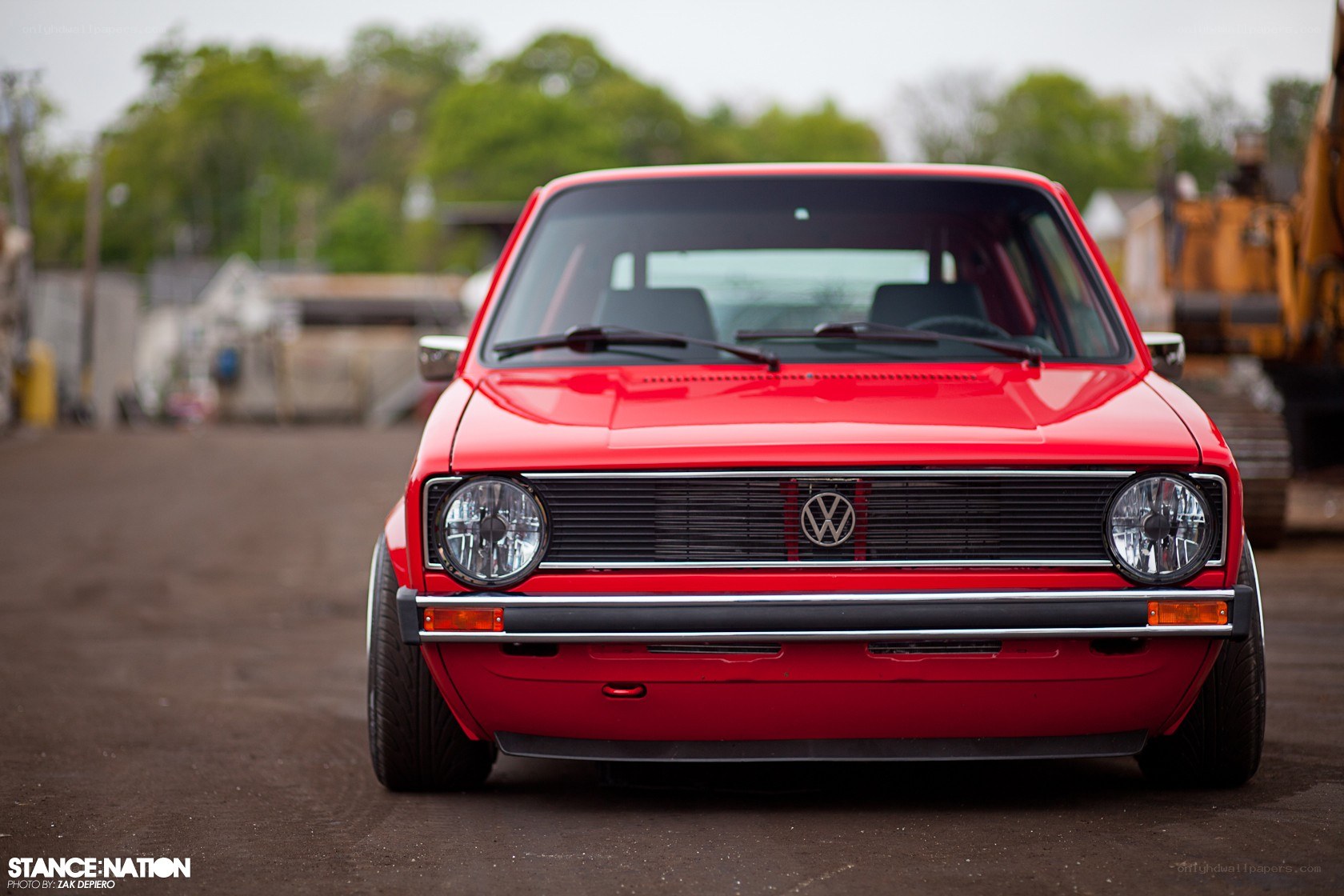 Red Volkswagen Golf front view