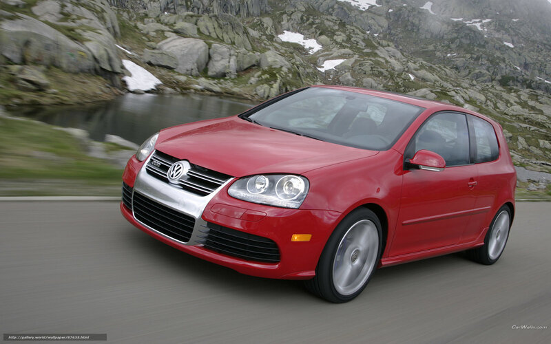 Red Volkswagen Golf GTI driving