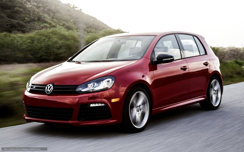 Red Volkswagen Golf R in motion