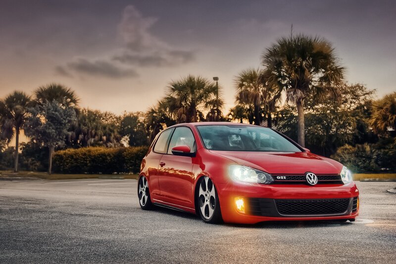Red Volkswagen GTI at dusk