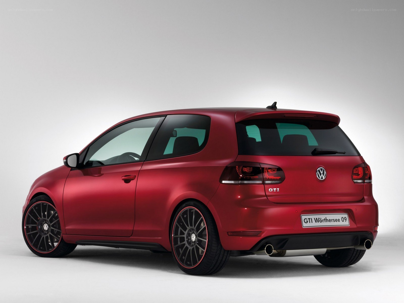 Red Volkswagen GTI hatchback