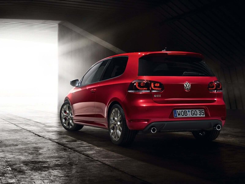Red Volkswagen GTI in garage