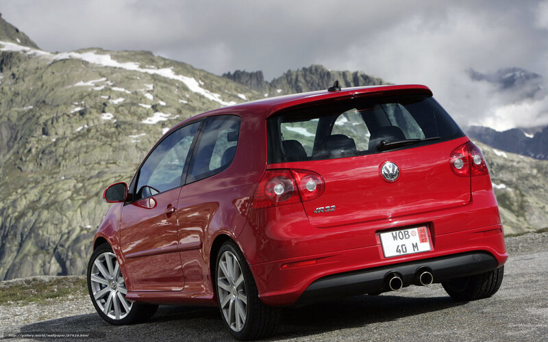 Red Volkswagen GTI in mountains