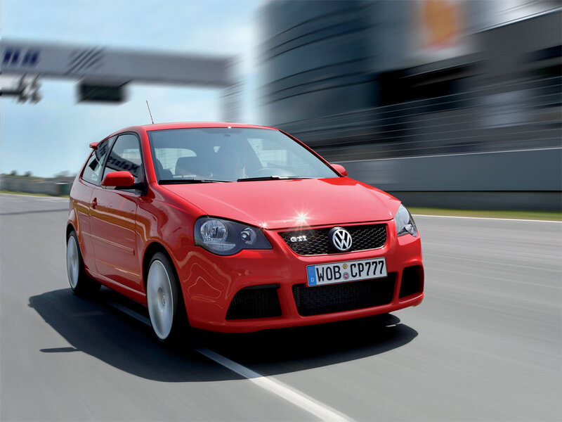 Red Volkswagen GTI on a racetrack