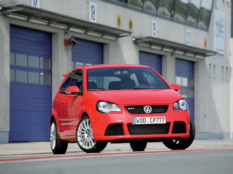 Red Volkswagen GTI on a racetrack