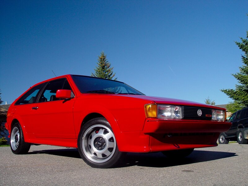 Red Volkswagen GTI parked outside