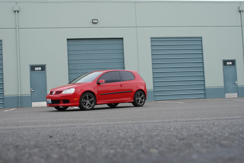 Red Volkswagen GTI parked outside