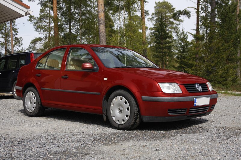 Red Volkswagen Jetta — Calm, Afternoon