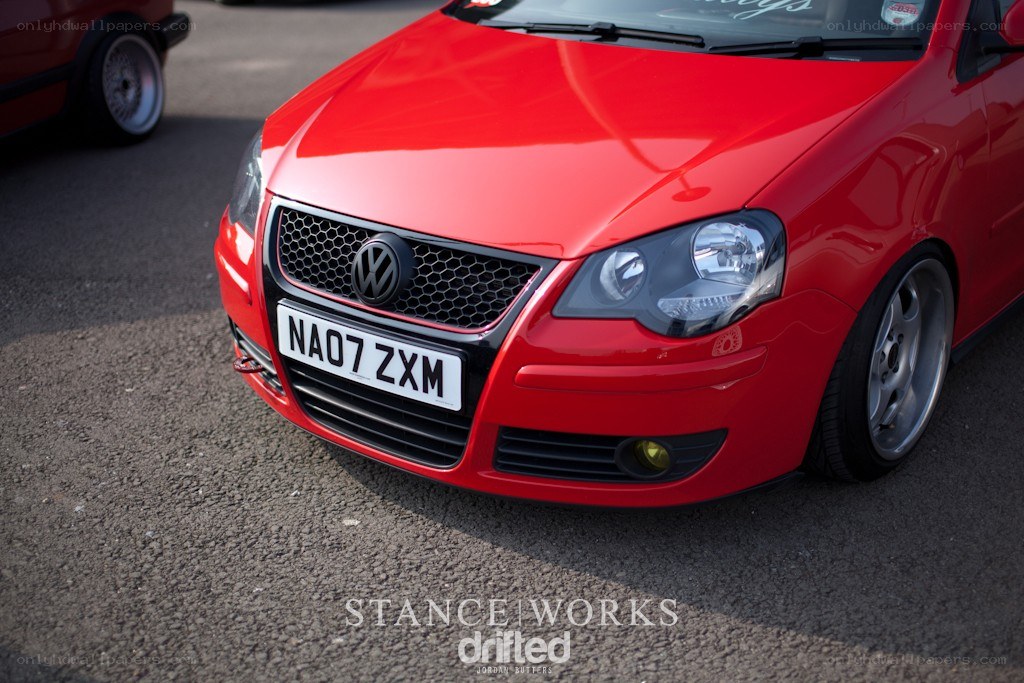 red volkswagen polo front view