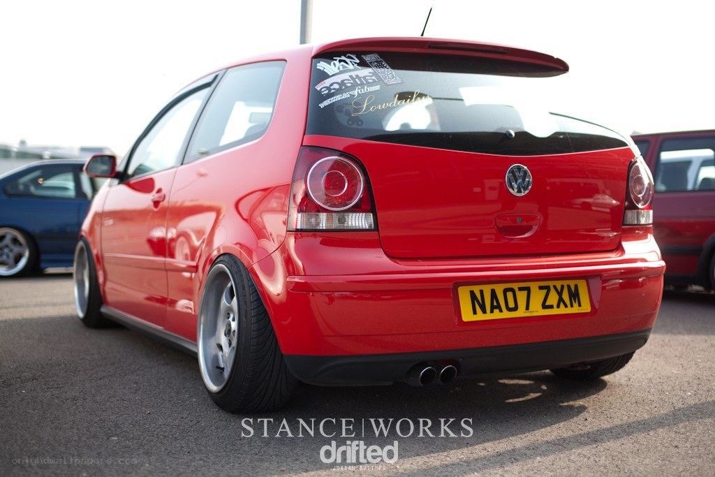 red volkswagen polo hatchback