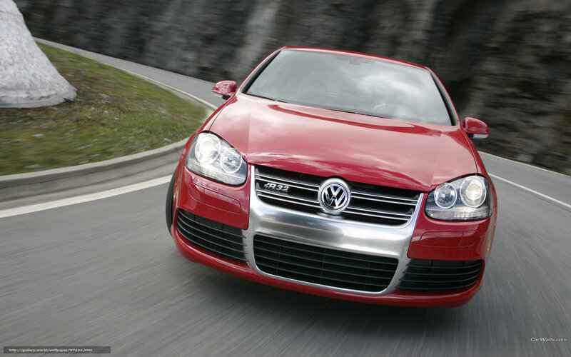 Red Volkswagen R32 on winding road