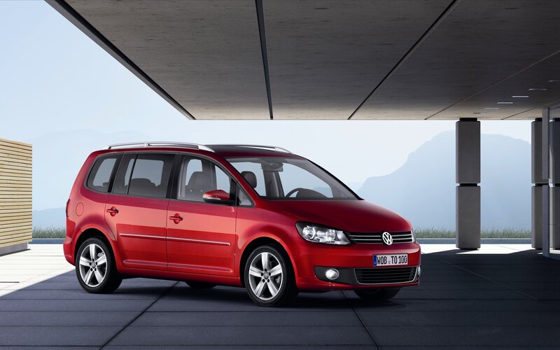 Red Volkswagen Touran parked