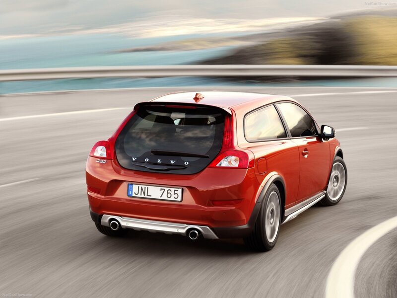 Red Volvo C30 in motion