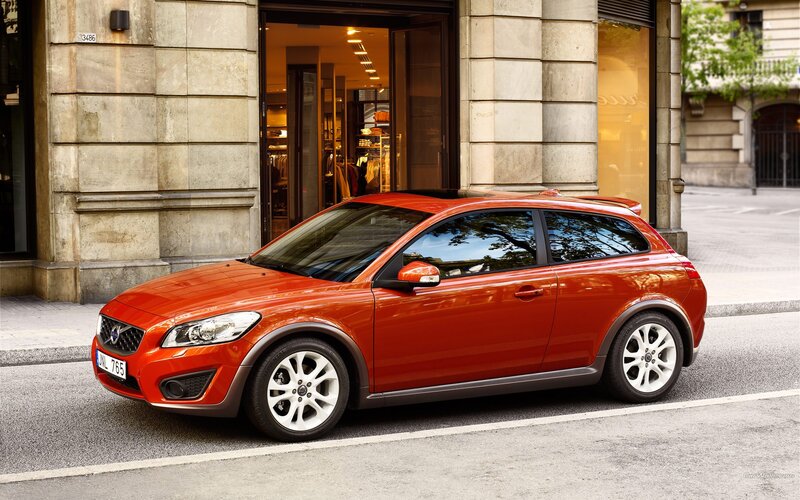 Red Volvo C30 parked on street