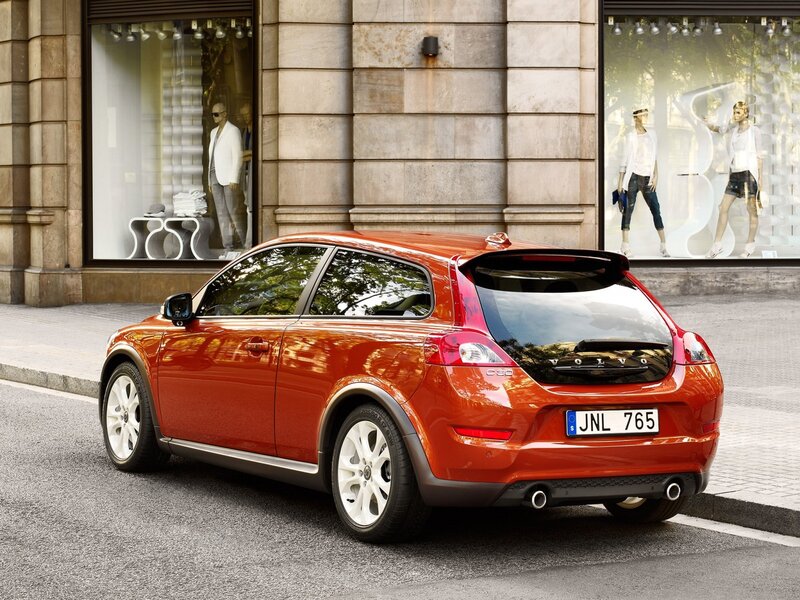 Red Volvo C30 parked on street