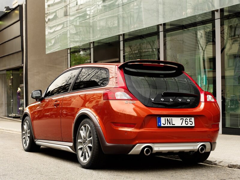 Red Volvo C30 parked on street