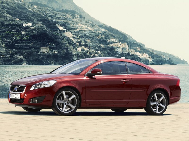 Red Volvo C70 by the sea