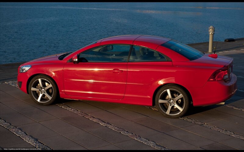 Red Volvo C70 by the water