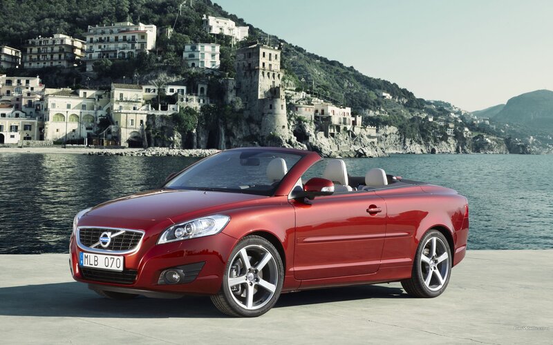 Red Volvo C70 convertible by the sea