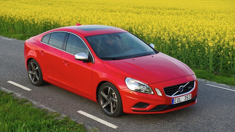 Red Volvo on a country road