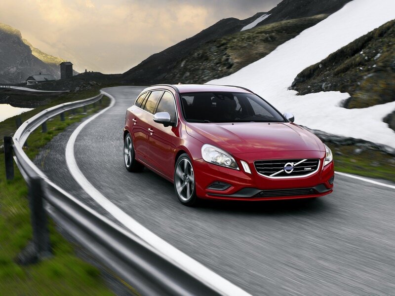 Red Volvo on mountain road