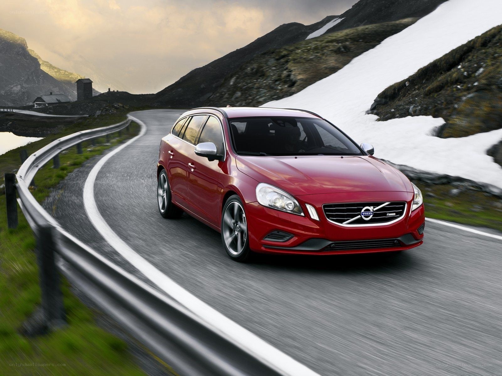 Red Volvo on mountain road