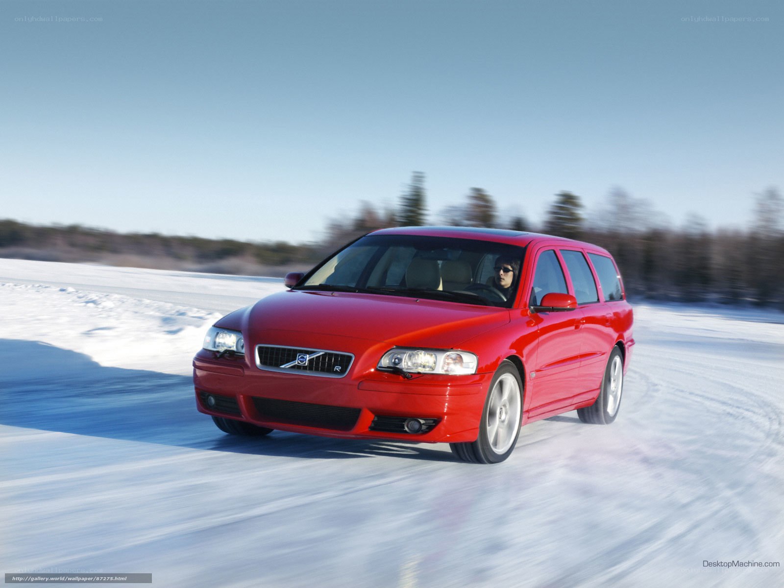 red volvo on snowy road
