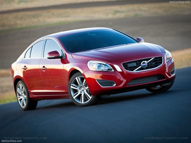 Red Volvo S60 in motion