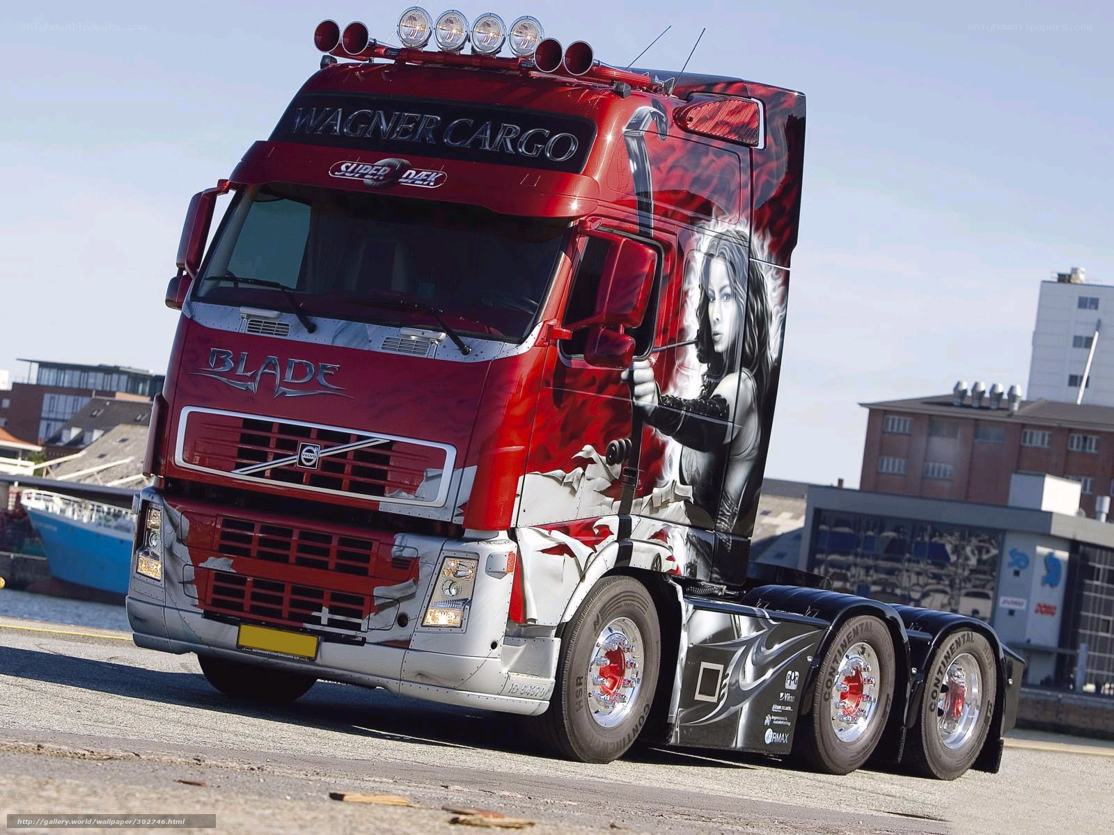 red volvo truck with custom paint