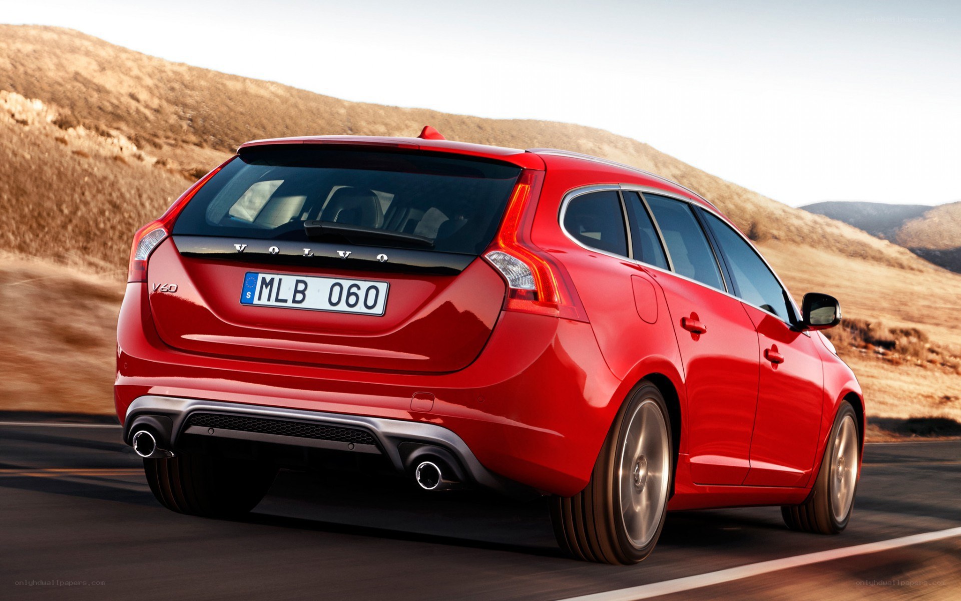 Red Volvo V60 in motion